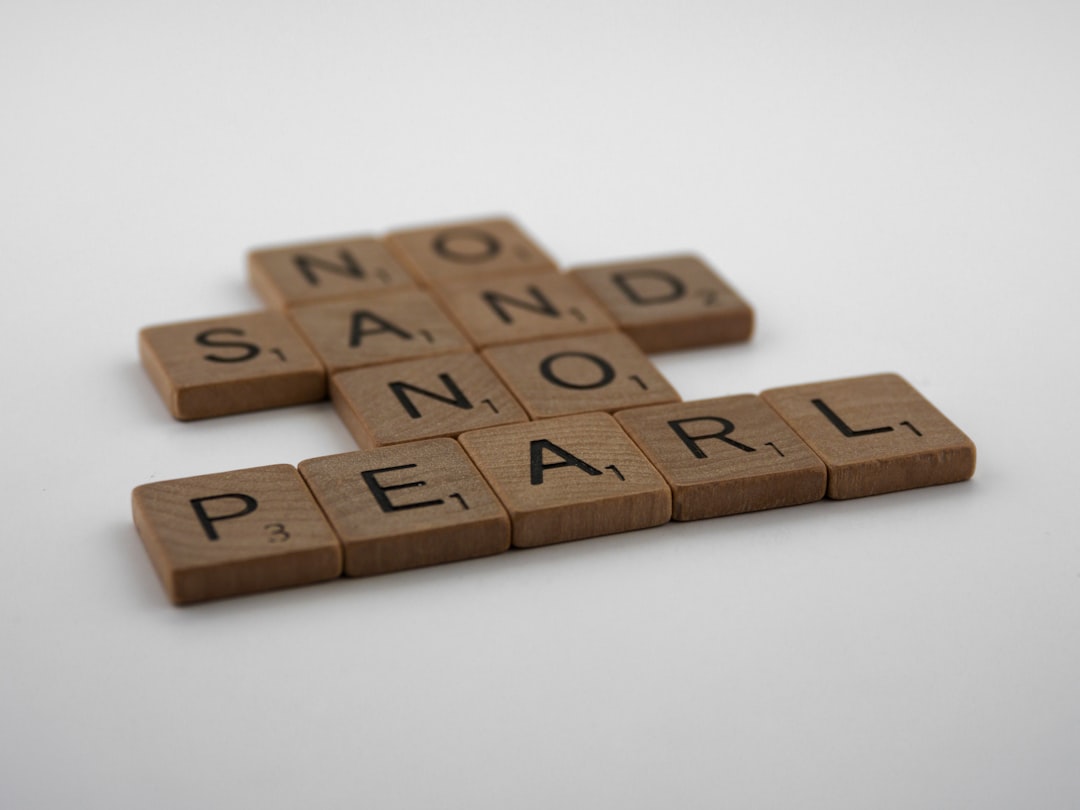 No Sand No Pearl, written in Scrabble Tiles