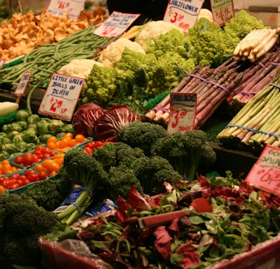 green and brown vegetables on display