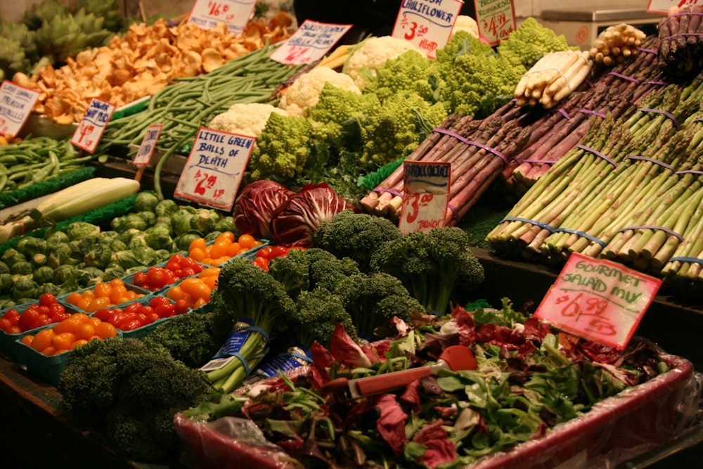 green and brown vegetables on display