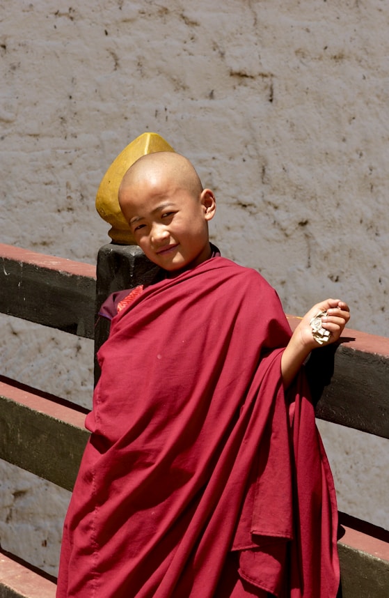 woman in red hijab and red long sleeve dress