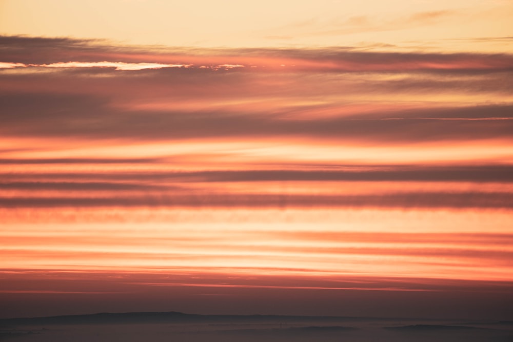 silhouette of clouds during sunset