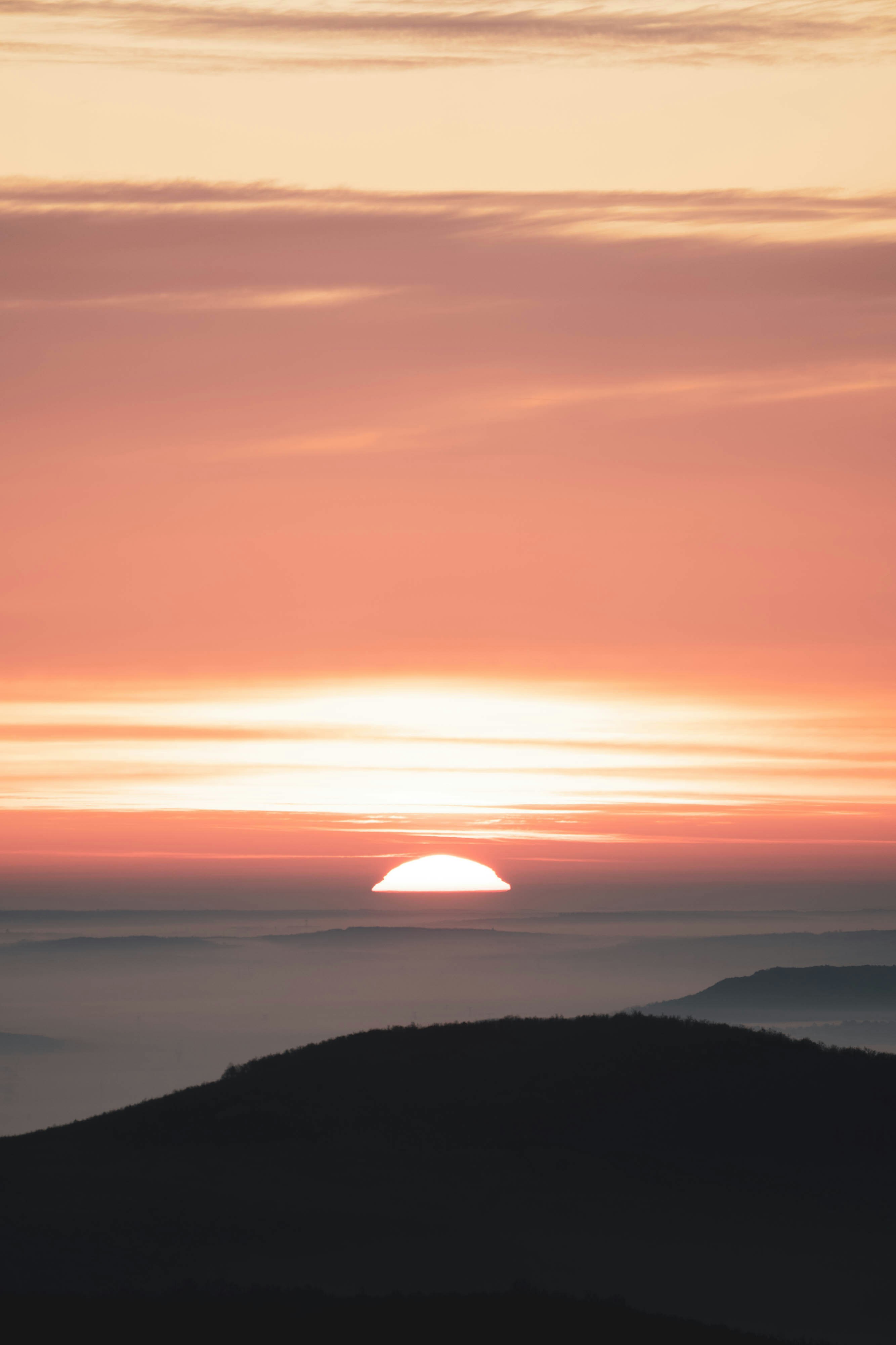 silhouette of mountains during sunset