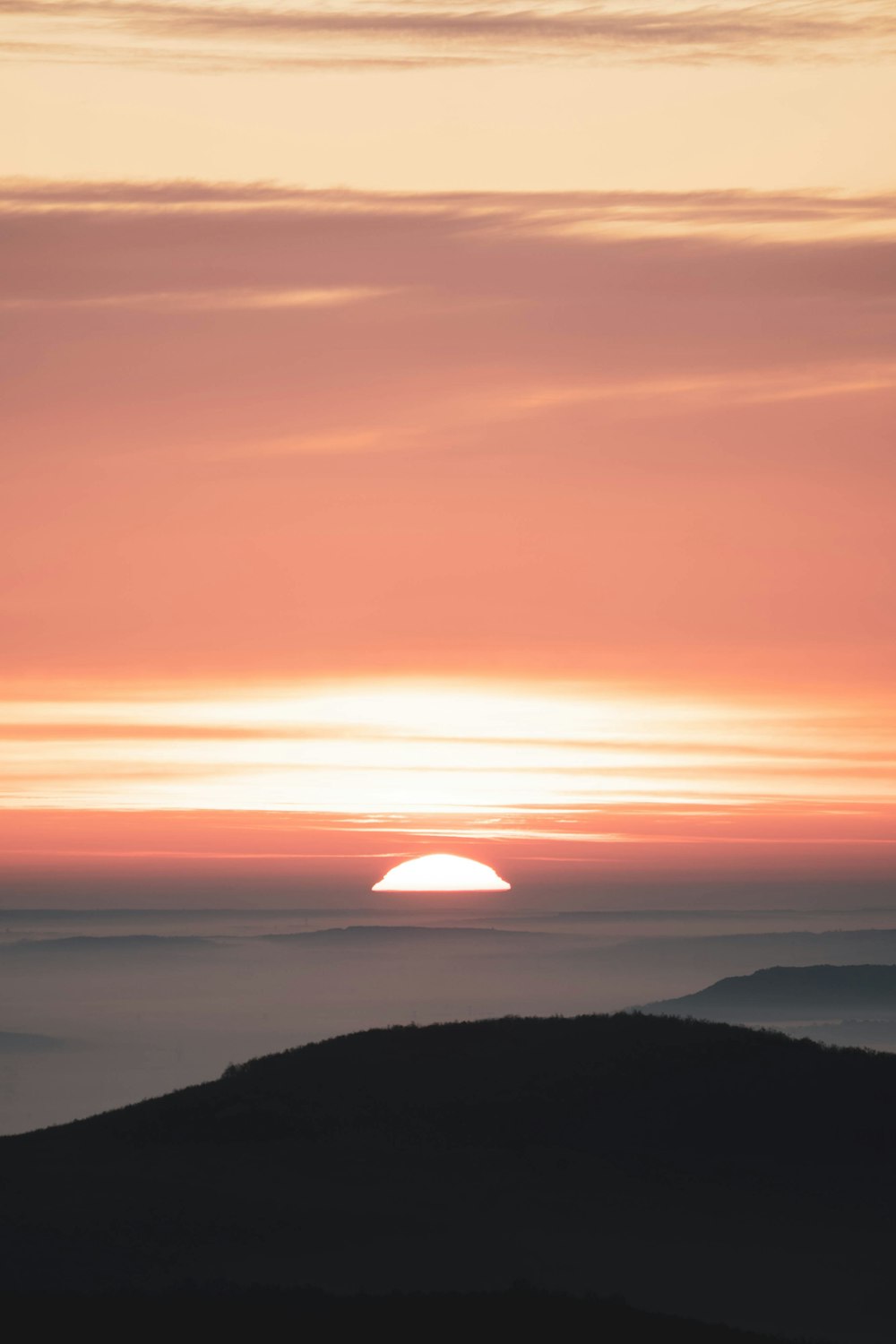 silhouette of mountains during sunset