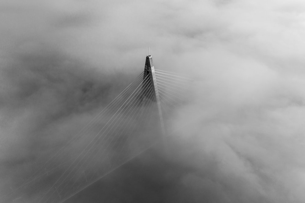 grayscale photo of a bridge