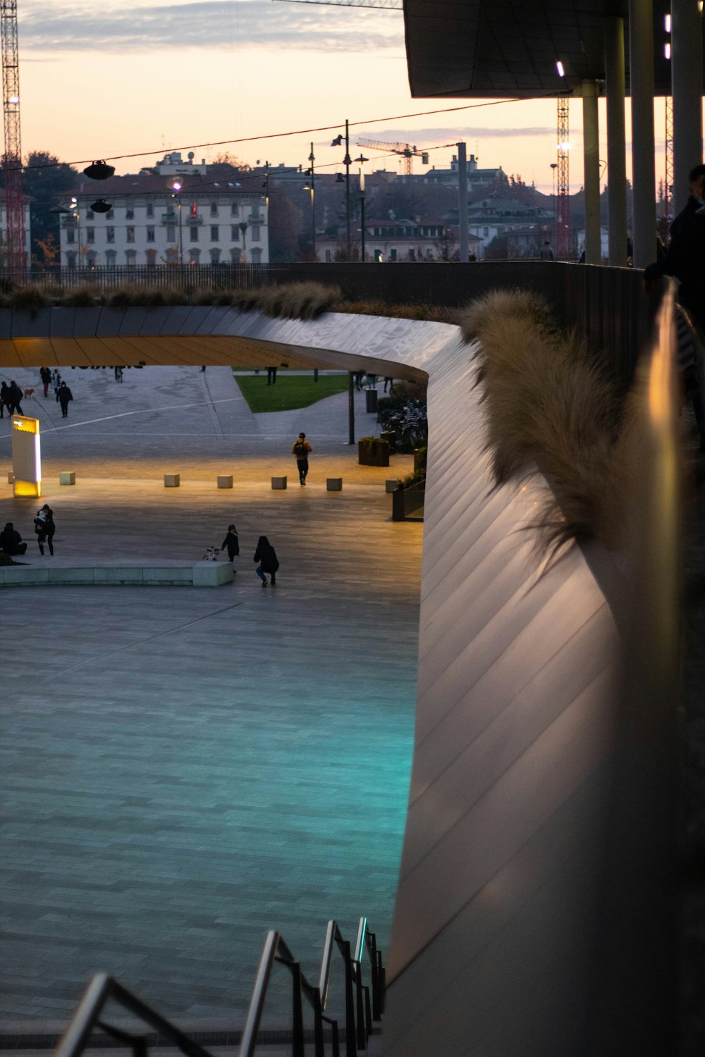 people walking on swimming pool during night time