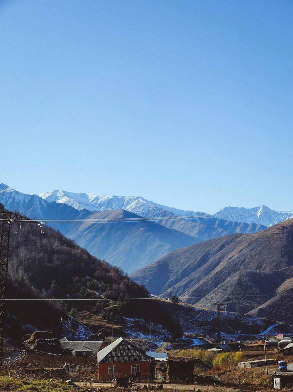 green and brown mountains under blue sky during daytime