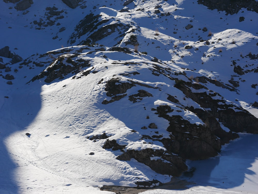 snow covered mountain during daytime