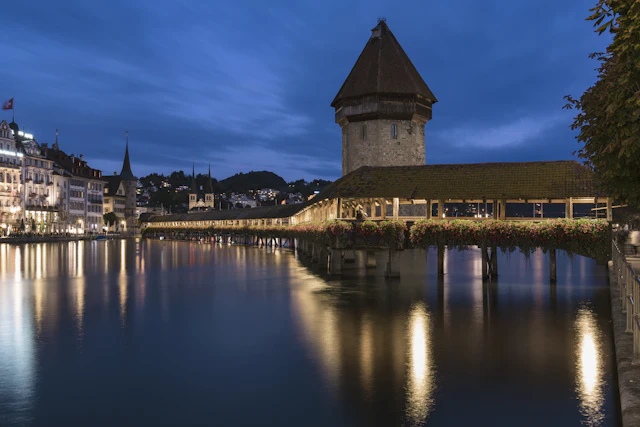 Lucerne Chapel Bridge over the river at dusk