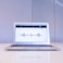 macbook air on white table