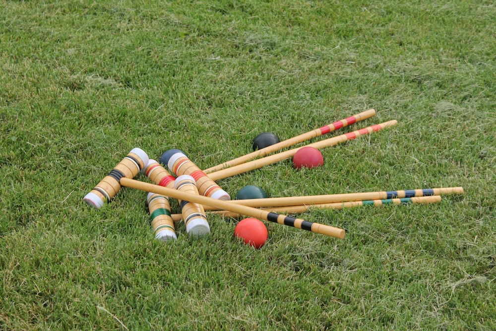 red and white balls on green grass