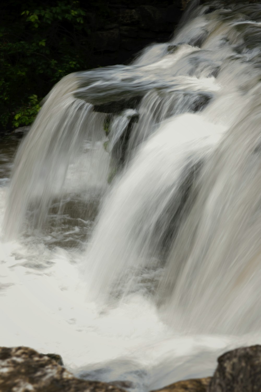 water falls on brown soil