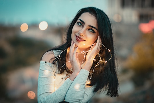 woman in white long sleeve shirt