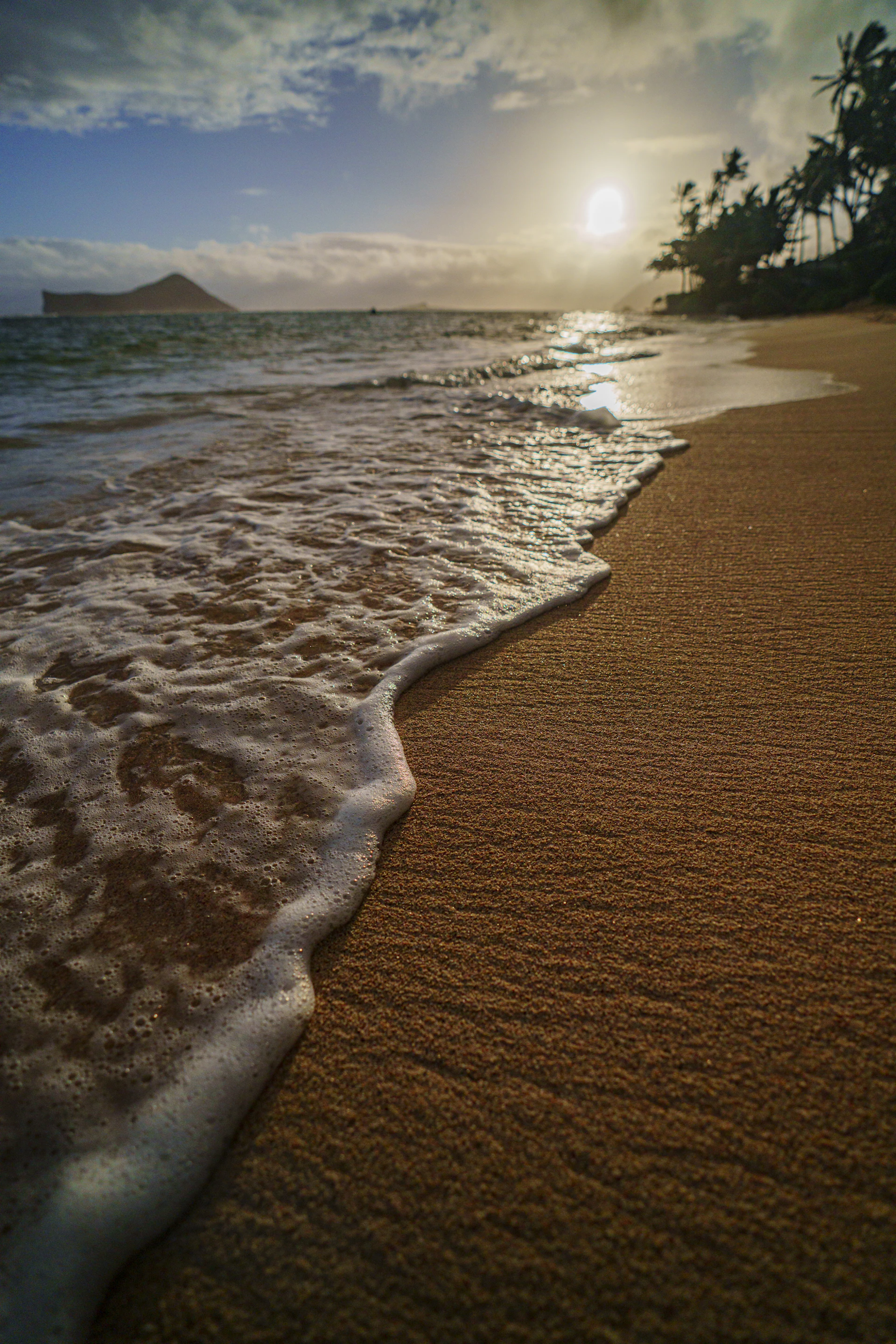 woman wearing yellow long-sleeved dress under white clouds and blue sky during daytime