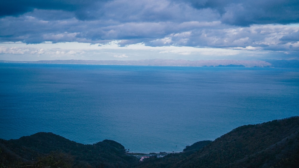 a large body of water surrounded by mountains