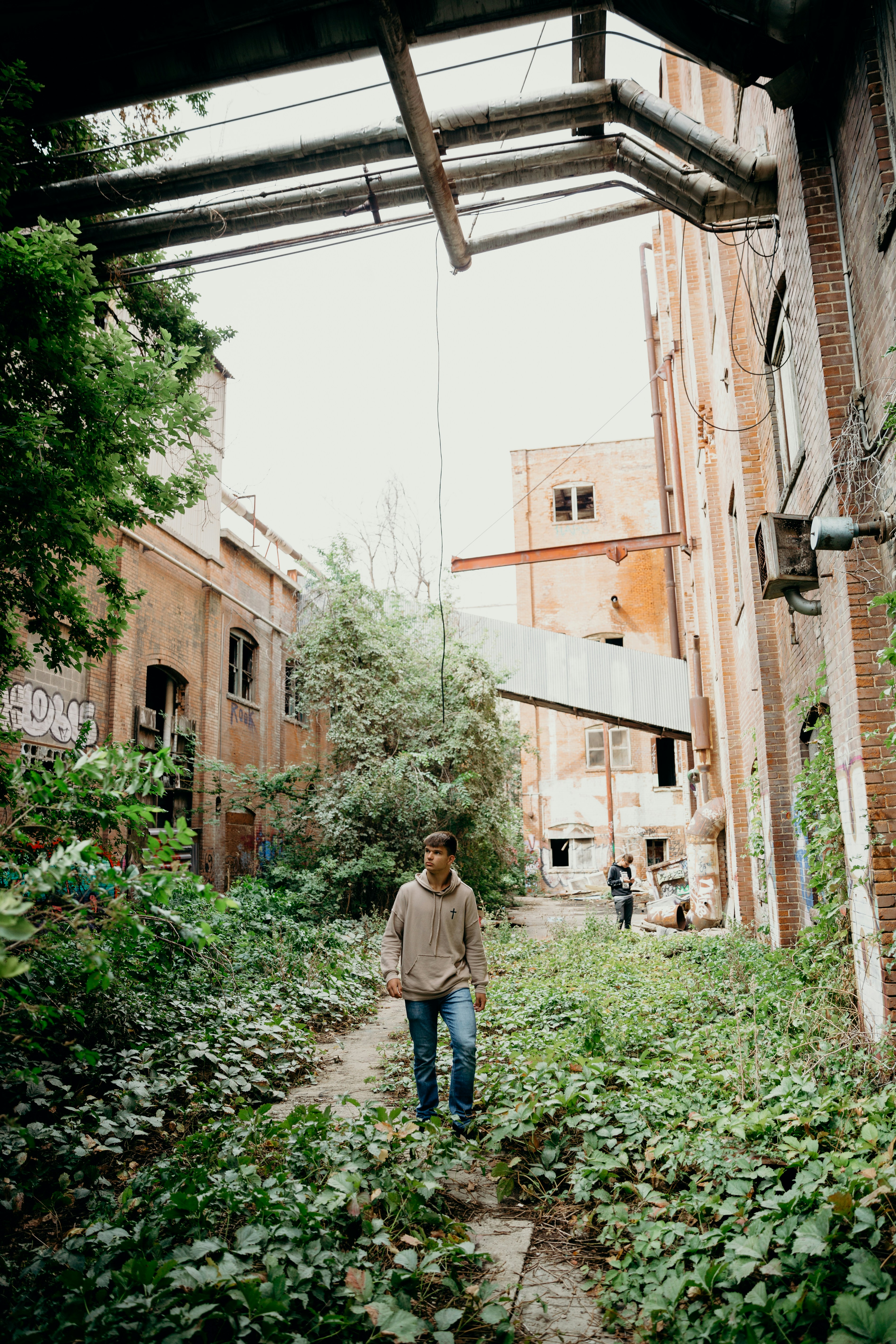 woman wearing yellow long-sleeved dress under white clouds and blue sky during daytime