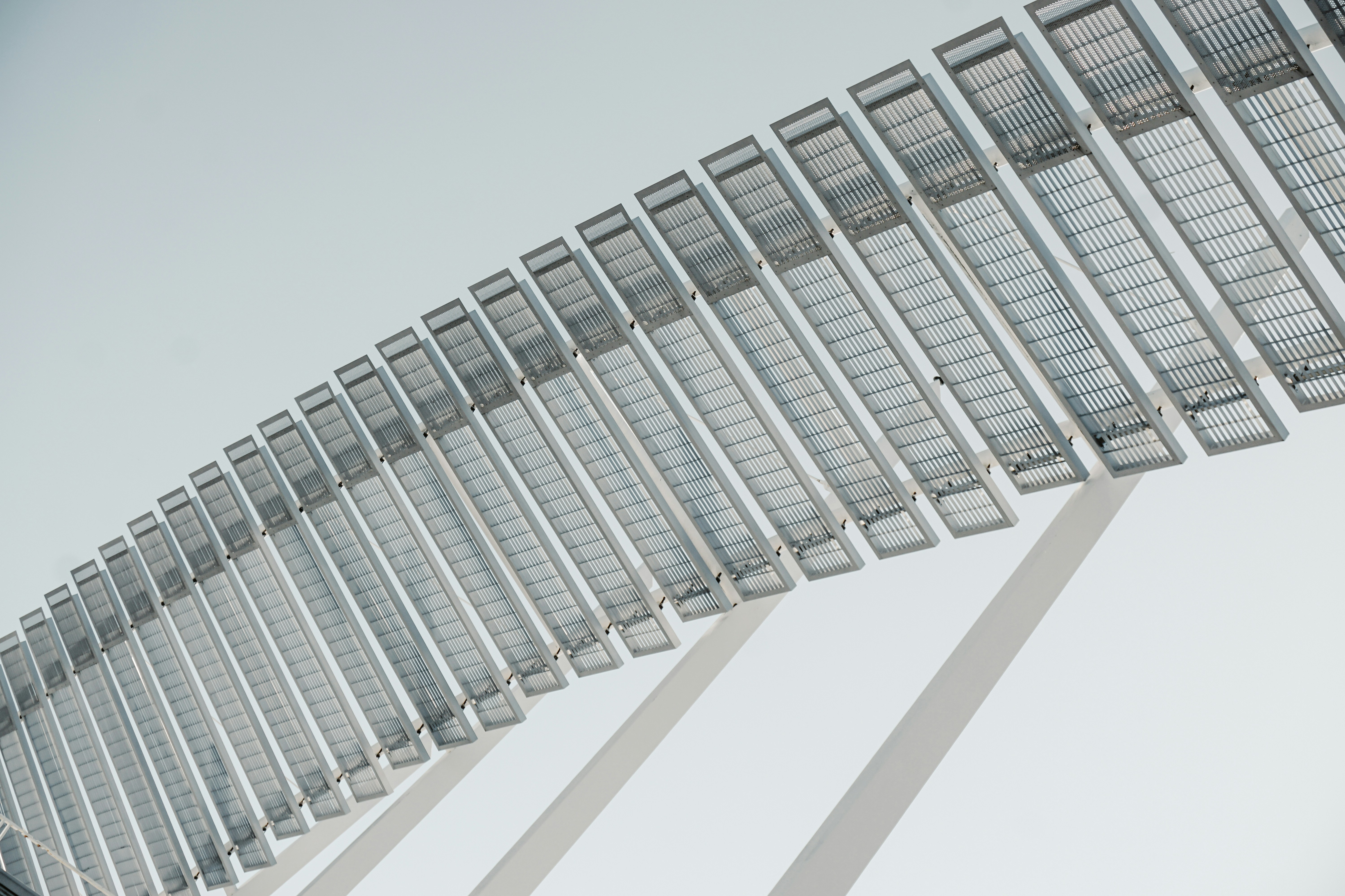 gray metal frame on brown wooden table