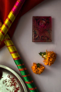Close-up of a vibrant ram tilak container with rich orange hues reflecting the bhagwa theme.