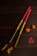 yellow and red pencil on brown wooden table