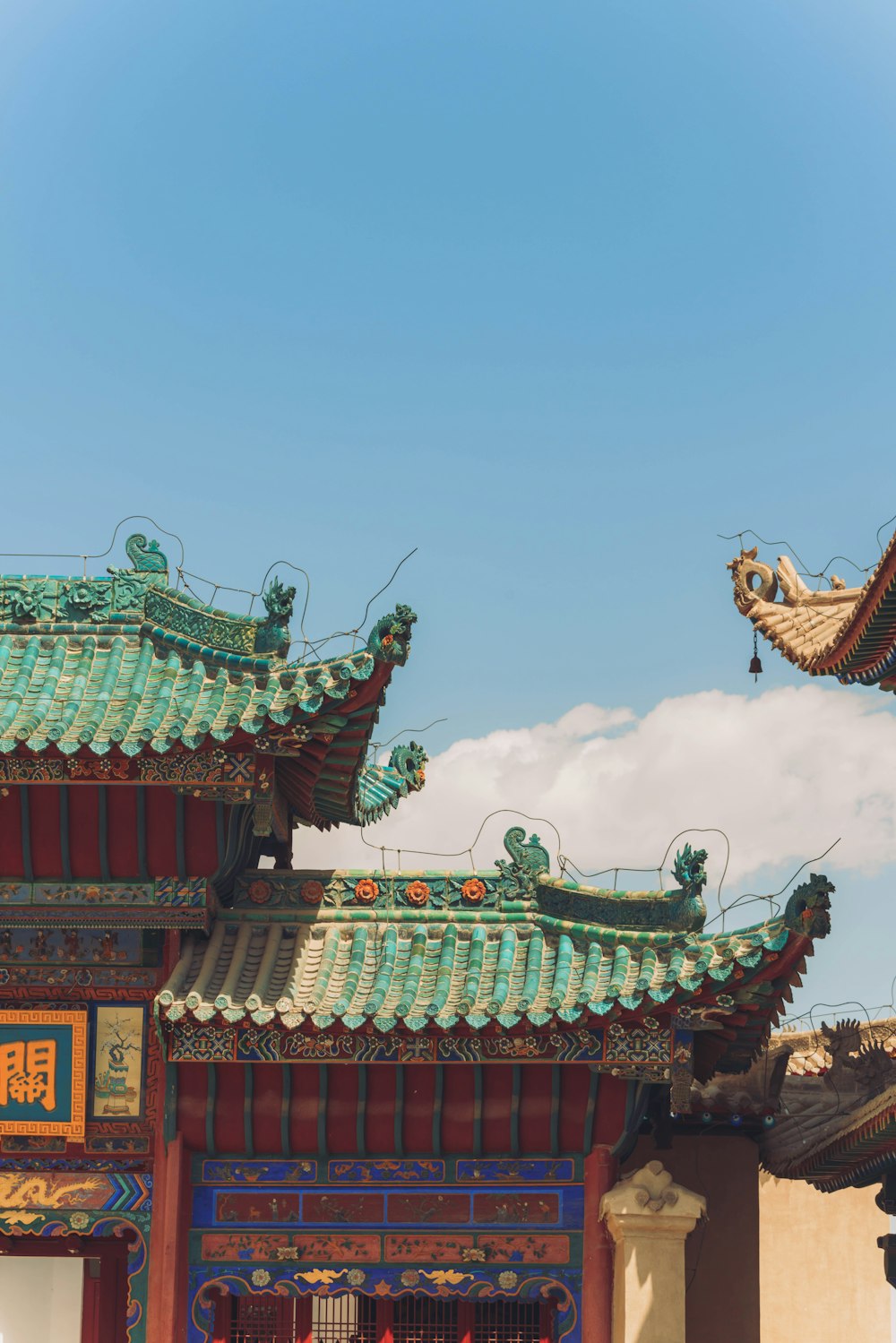 red and brown temple under blue sky during daytime