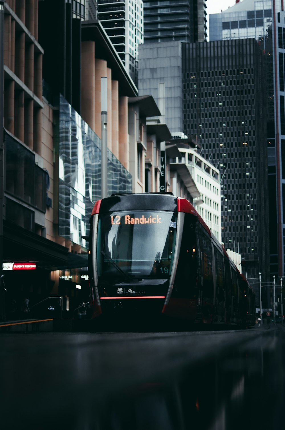 black and white train on the street