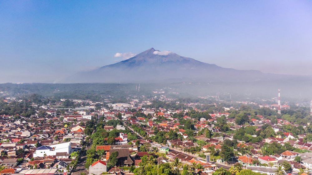 aerial view of city near mountain during daytime