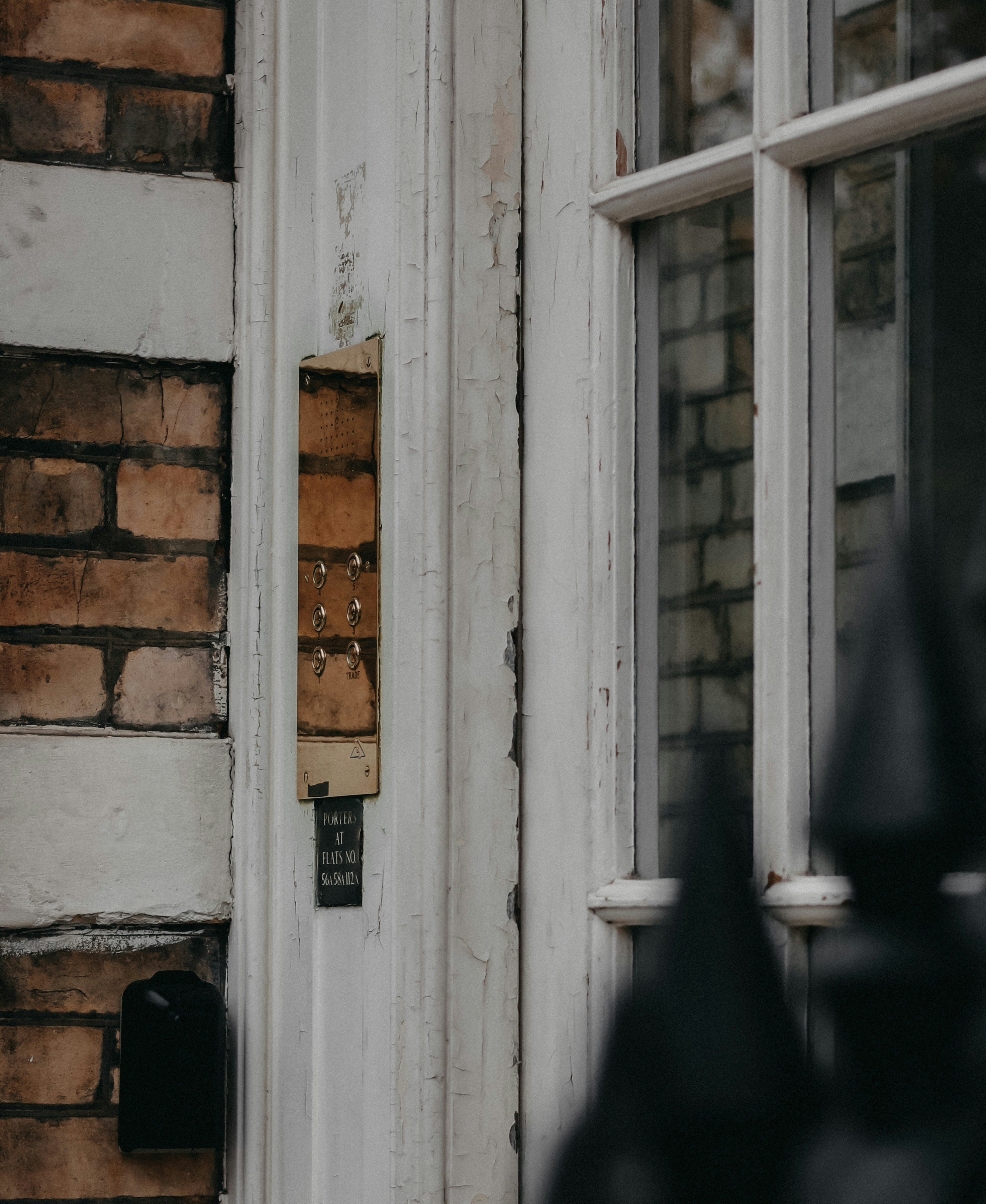 white wooden door with black door lever