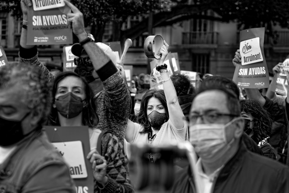 grayscale photo of people in black and white