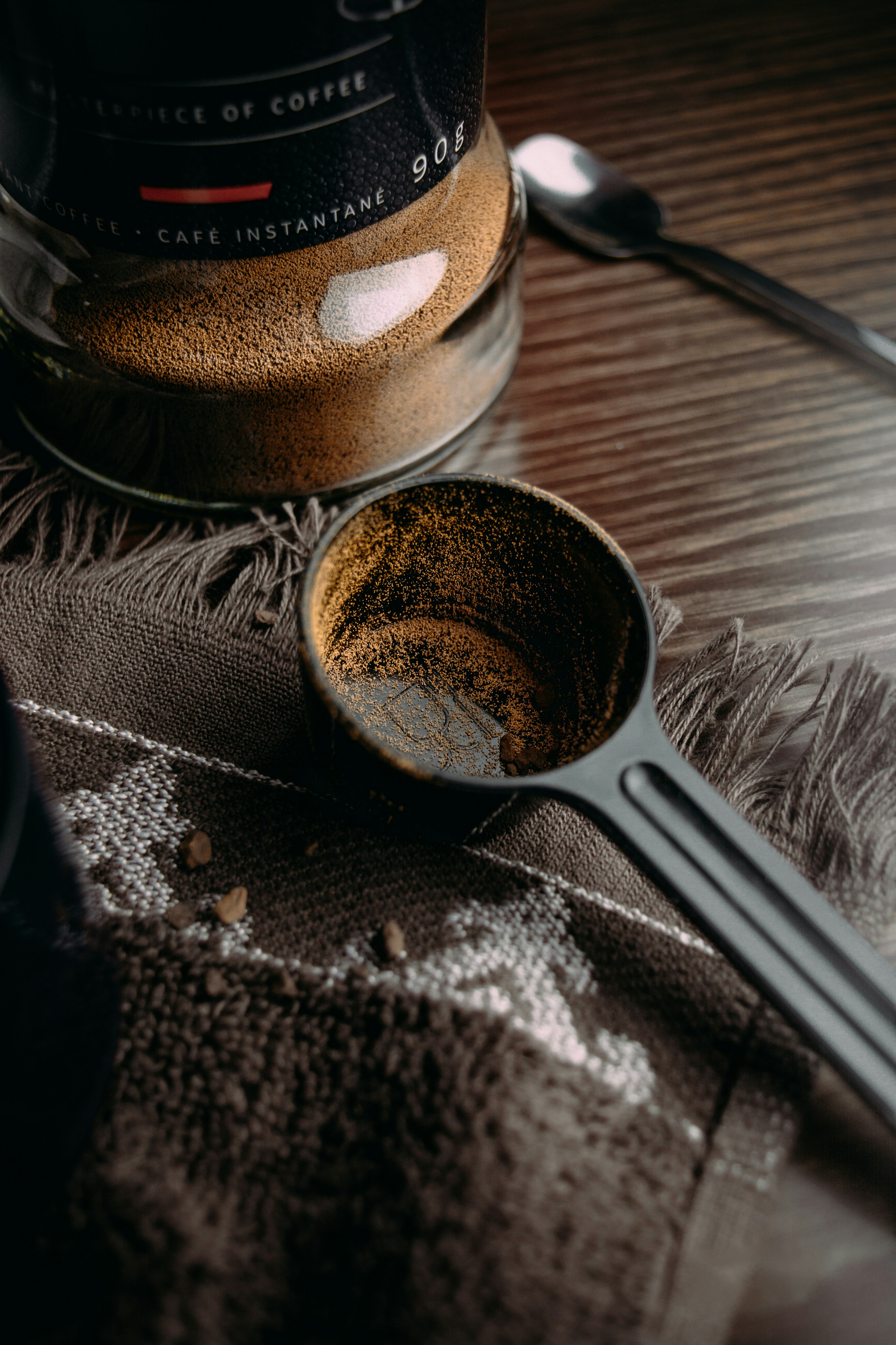 stainless steel spoon on black ceramic bowl