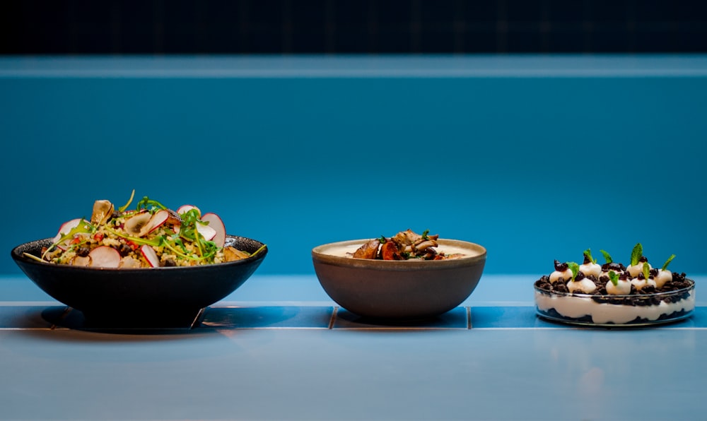 brown and blue ceramic bowl with food