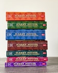 stack of books on white table