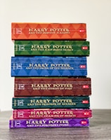 stack of books on white table
