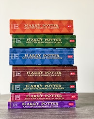 stack of books on white table
