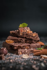 Handmade chocolate truffles being prepared in a confectionery kitchen