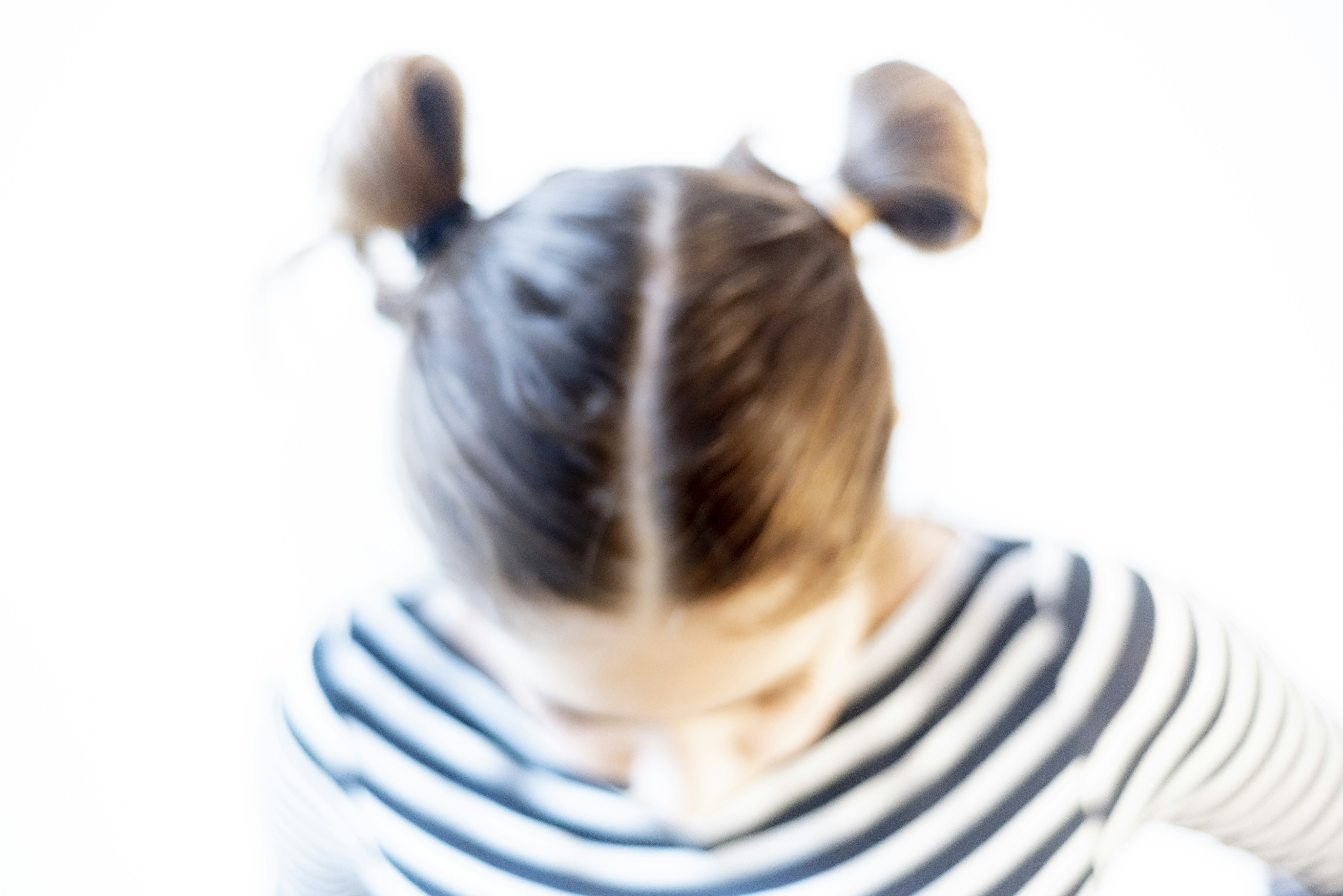 person in black and white striped shirt