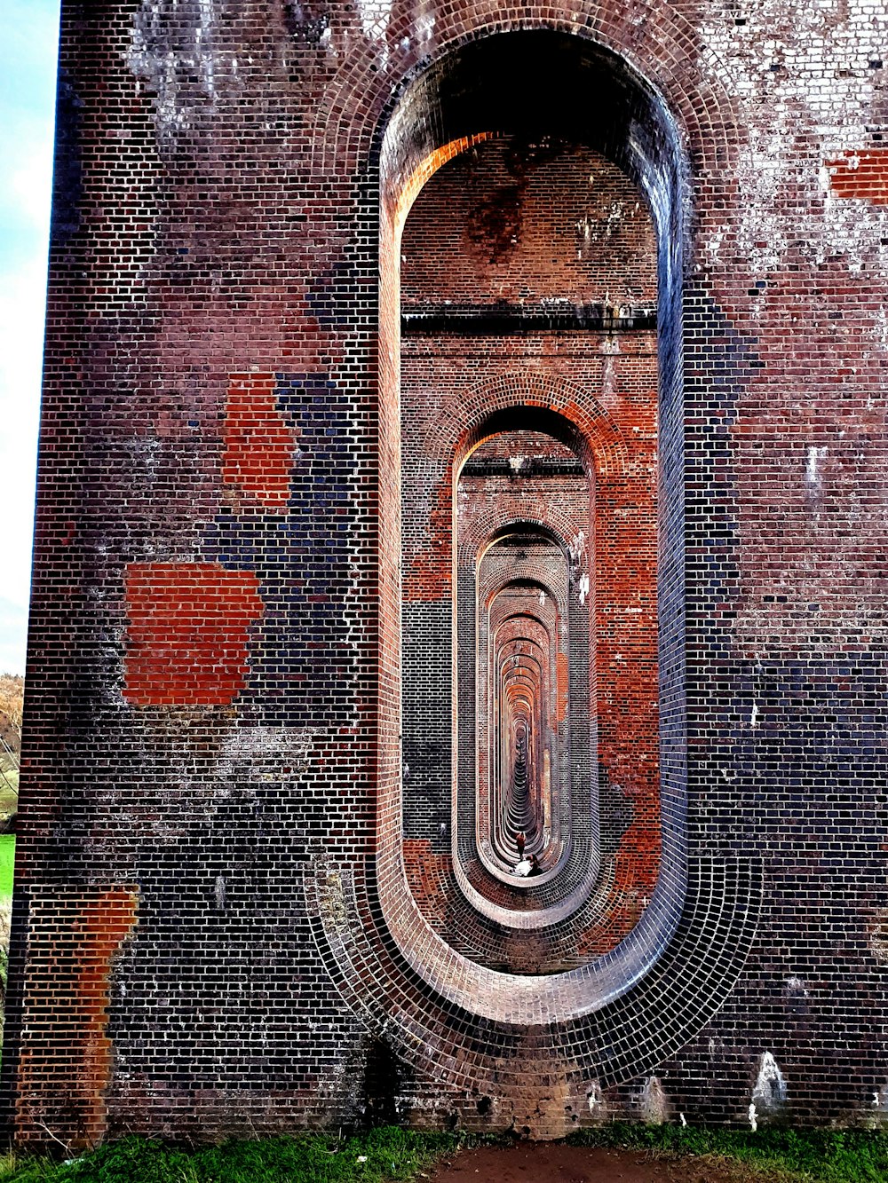 brown brick wall with hole