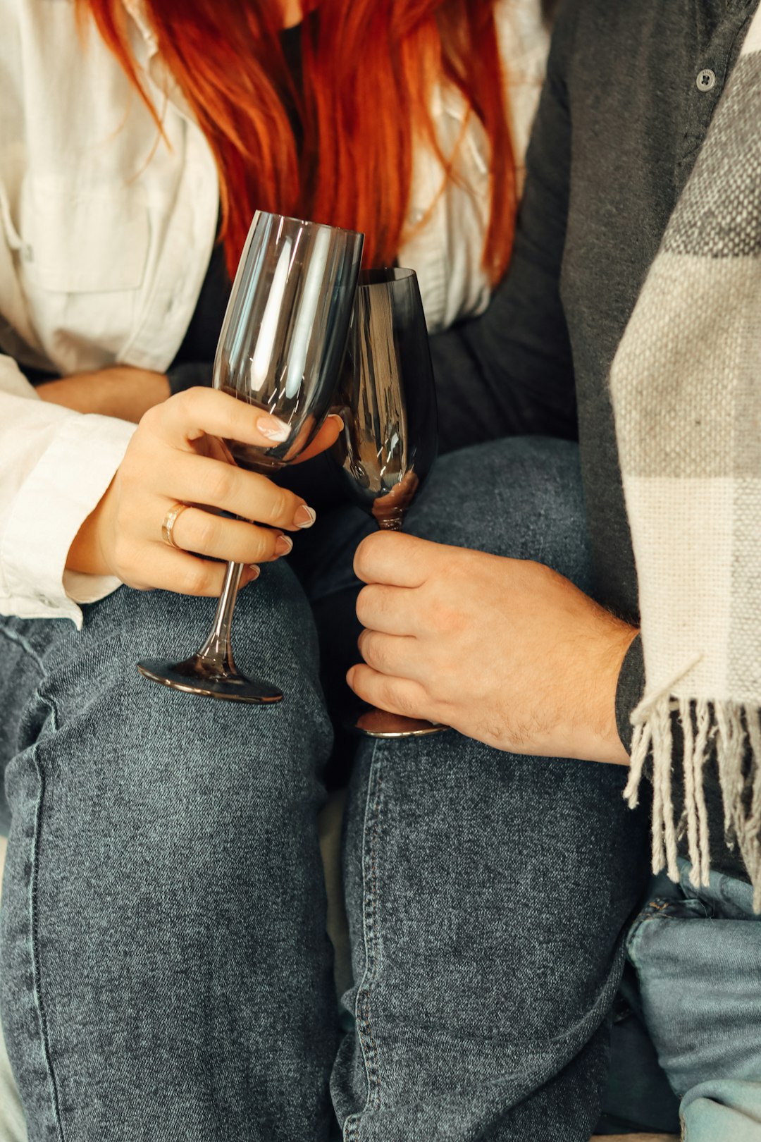 person holding clear wine glass