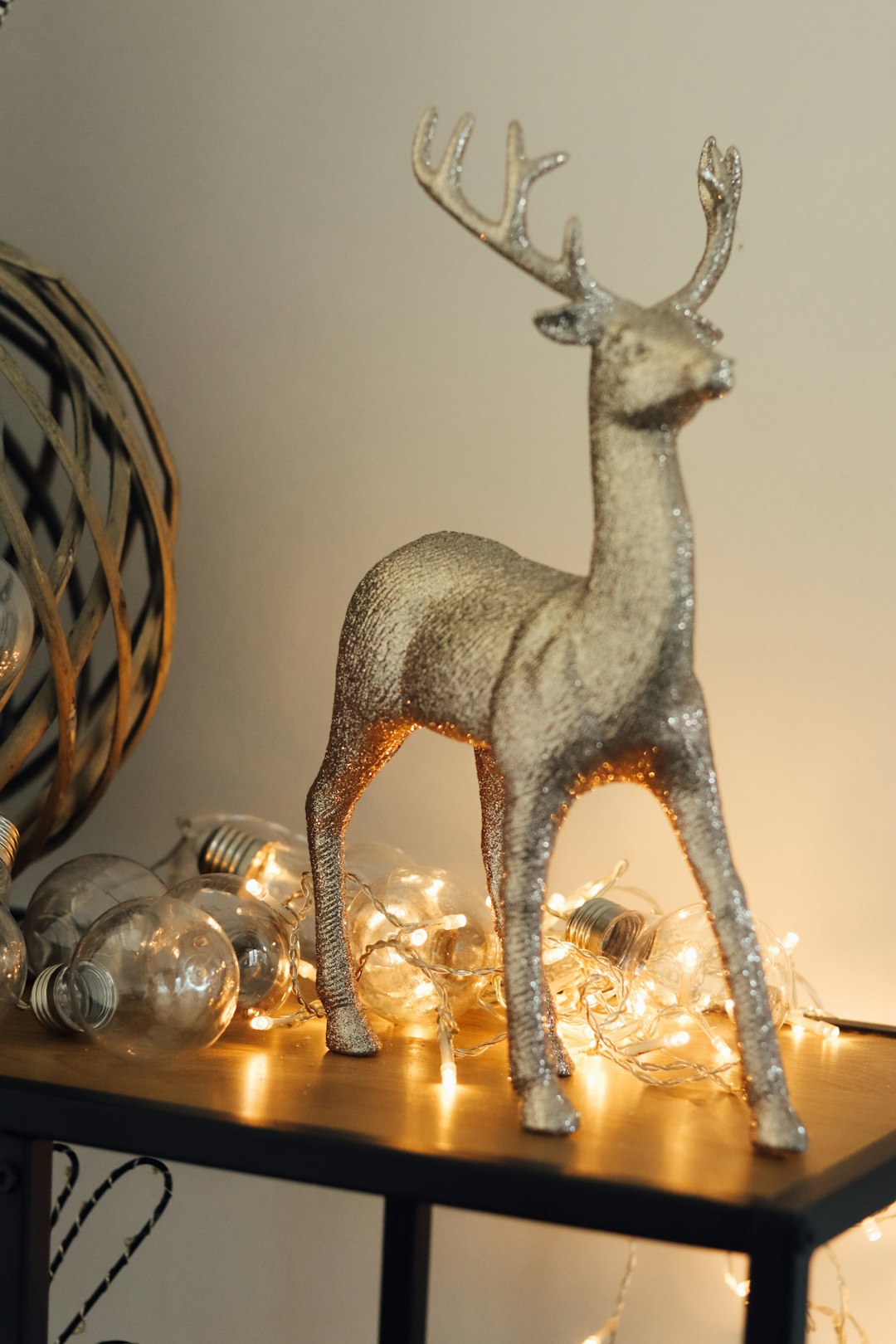 white and brown deer figurine