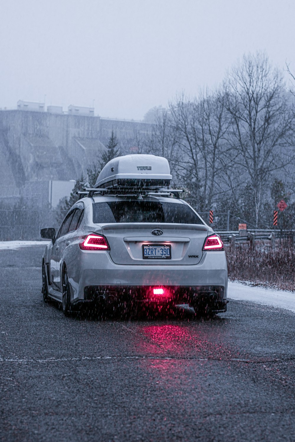 white bmw m 3 on road during daytime