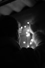 A technician checking and maintaining Christmas lights.