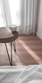white ceramic mug on brown wooden table