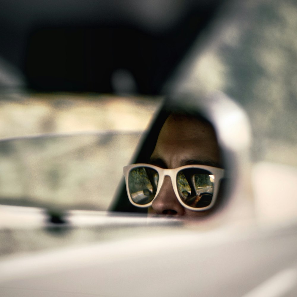 woman in black framed eyeglasses