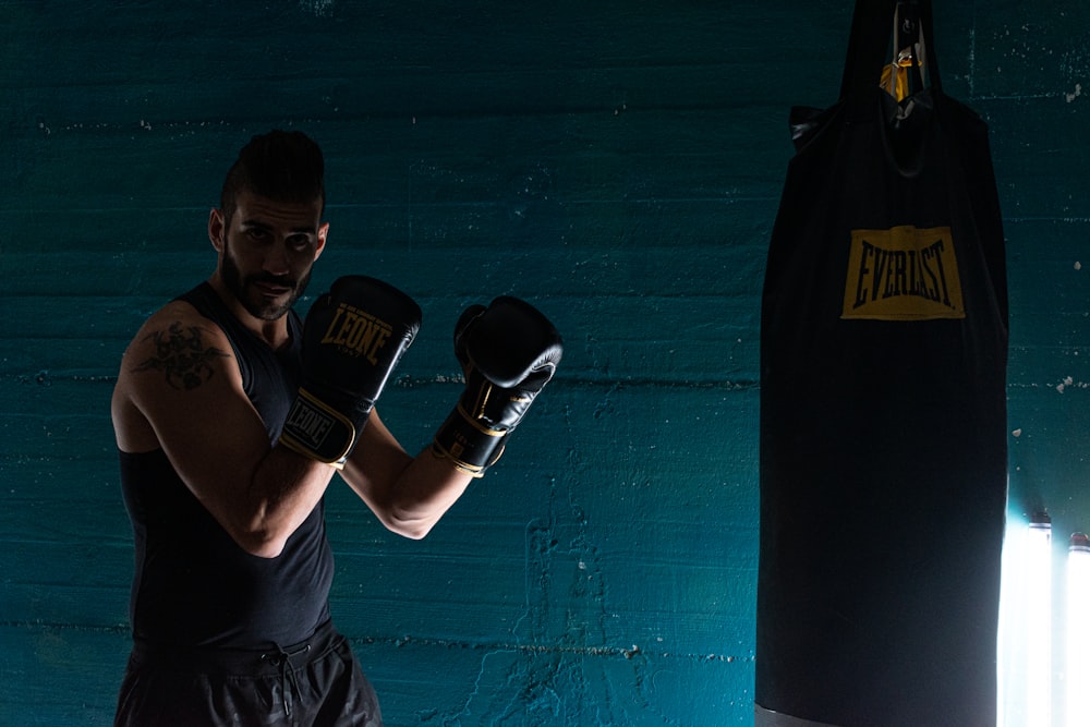 man in black boxing gloves