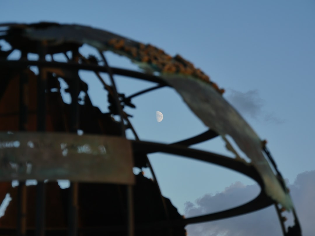 brown wooden ship wheel during daytime