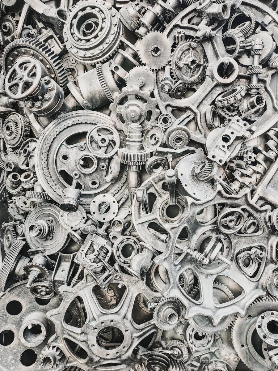 Dense collection of metal gears, cogs and machine parts