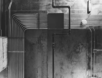 grayscale photo of water fountain