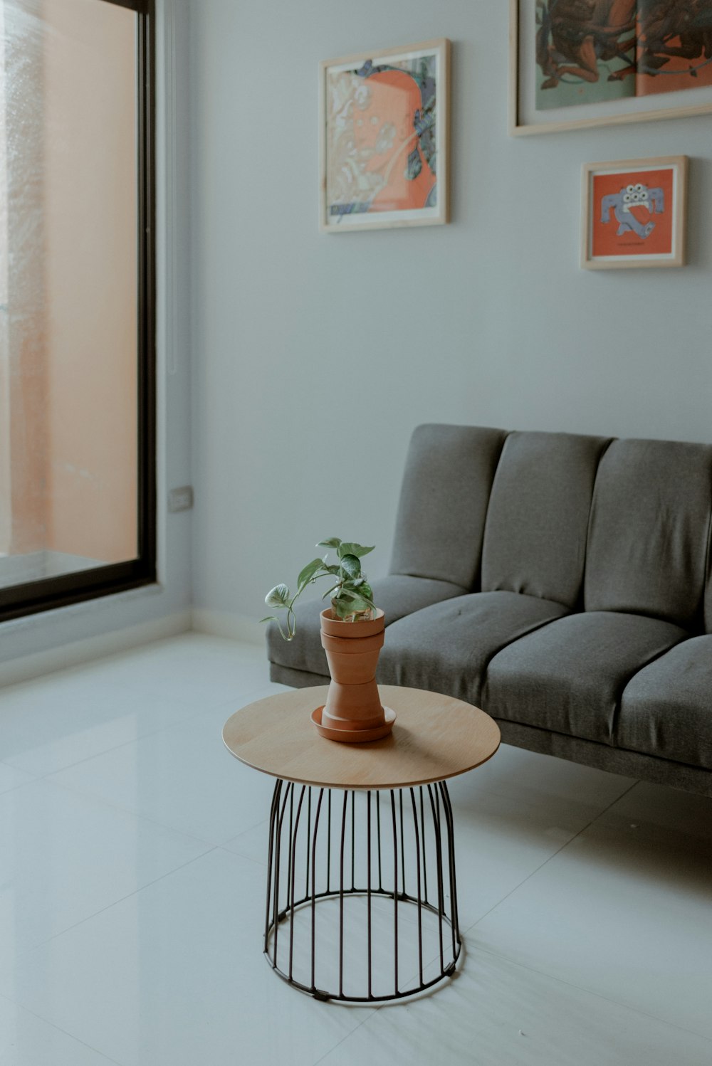 green plant on brown wooden round table