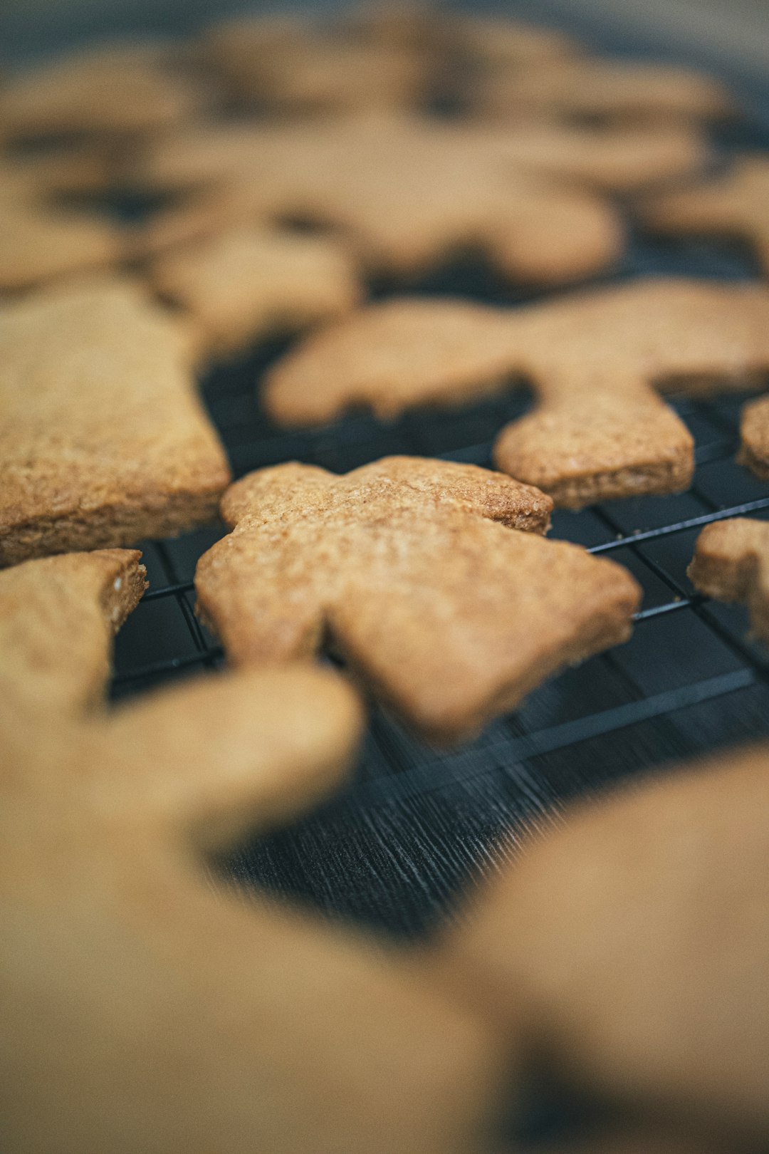 brown cookies on black metal grill