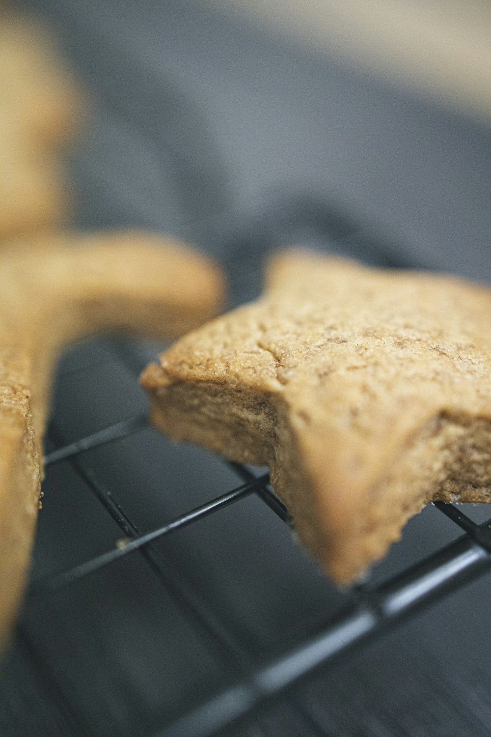 brown bread on black metal grill