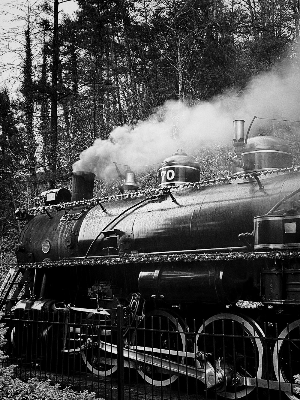 grayscale photo of steam train