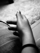 Close-up of a child taking a dermatoglyphics multiple intelligence test.